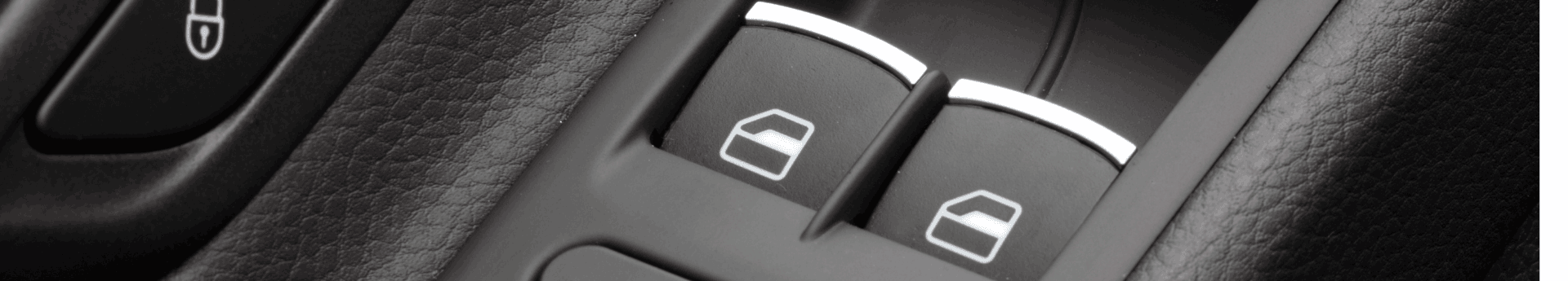 Gros plan sur les boutons de commande de lève-vitre électrique d une portière de voiture