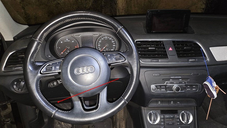 Vue de l habitacle et du volant d une Audi Q3 pour le diagnostic auto