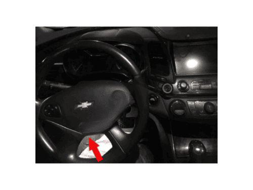 Détail du volant et du tableau de bord d'une Chevrolet Impala pour le diagnostic auto